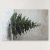 Minimalistische kerstboom met zachte lichten op sn legpuzzel (Horizontaal)