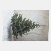 Minimalistische kerstboom met zachte lichten op sn theedoek (Horizontaal)