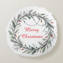 Minimalistische kerstkrans en -verlichting rond kussen