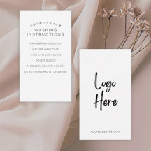 Minimalistische logo wasinstructies in het wit