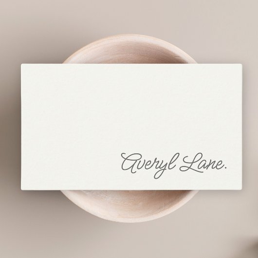 Minimalistische luxe boetiekivoor elegant script visitekaartje