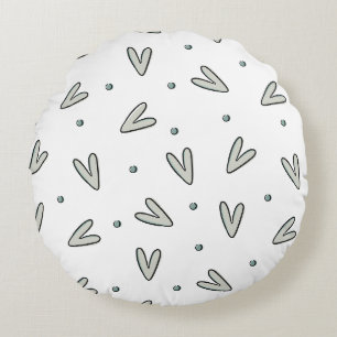 Minimalistische saliegroene harten & stippenpatroo rond kussen