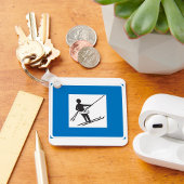 Minimalistische skilift symbool met blauwe rand sleutelhanger