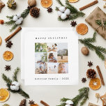Minimalistische Typewriter familie fotocollage Feestdagenkaart<br><div class="desc">Deze eenvoudige en moderne familiefoto collage kerstkaart biedt een plek voor u om uw namen toe te voegen, en een vrolijk kerstbericht op de achterkant in prachtige typemachinetypografie, evenals ruimte voor u om uw eigen fotomontage toe te voegen (met ruimte voor zeven foto's). De perfecte minimalistische kerstvakantie kaart voor uw...</div>