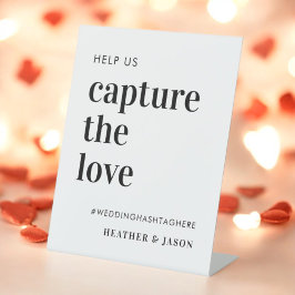 Minimalistische Vet Help ons het Love Hashtag vast Reclamebord Met Voetstuk