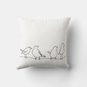 Minimalistische vogels op een draad lijnkunst op k kussen