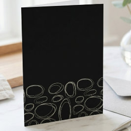 Minimalistische witte krabbelcirkels op zwart kaart
