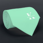 Mint Green Elegant Monogram   naam éénzijdig Stropdas<br><div class="desc">Een elegante eenzijdige stropdas met een gewaagd wit monogram over een Mint Green achtergrond. Bovenop dit monogram staat je voor- of achternaam in alle hoofdletters. Als u de voorkeur geeft aan een stoutmoediger zoeken naar de persoonlijke naam in de grote letter kunt u het volgende doen: Gebruik de functie aanpassen...</div>