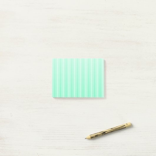 Mint-groene strepen van snoep post-it® notes (Op bureau)