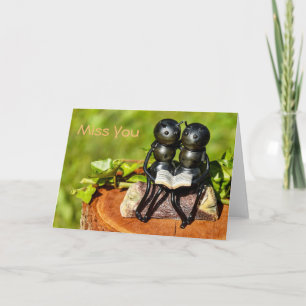 "Miss You"-kaart met twee kaartenstaarten die een  Kaart