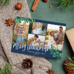 Mistletoe Twigs Navy Photo Collage Merry Kerstmis Feestdagenkaart<br><div class="desc">Foto kerstkaart met foto's met vier foto's en  maretaildraden in groen en bleke blauw. Vrolijk kerstfeest wordt geschreven in een wit,  charmante kalligrafiescript. Voeg uw familienaam en het jaar in een elegante witte doopvont tegen een marine blauwe achtergrond toe. De rug kenmerkt een overeenkomstig mistletoe patroon.</div>