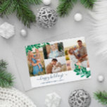 Mistletoe Twigs Photo Collage Prettige feestdagen Feestdagenkaart<br><div class="desc">Foto kerstkaart met foto's met vier foto's en  maretaildraden in groen en bleke blauw. Prettige feestdagen is geschreven in een blauw,  charmante script. Voeg uw familienaam en het jaar in elegante blauwe doopvonten toe. Op de achterzijde is een overeenkomend mistletoe-patroon in wit en marinesurk blauw aangebracht.</div>
