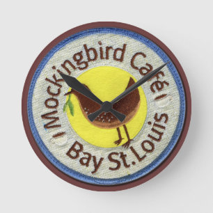 "mockingbird cafe"-klok ronde klok