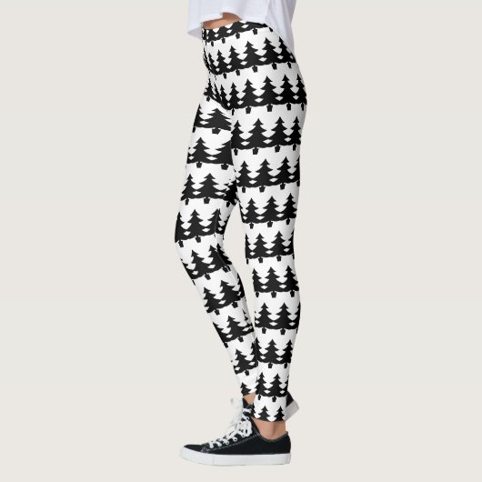 Mode met de witte kerstboom en de zwarte luis leggings (Links)