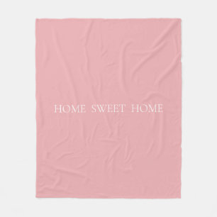 Modern abstract bloempatroon op koraalroze fleece deken