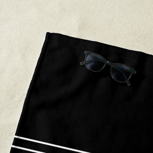 Modern Black Monogrammed White Script Beach Towel Strandlaken (In situ)