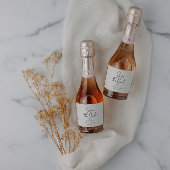 Modern casual script black save the date wedding sparkling wijnetiket