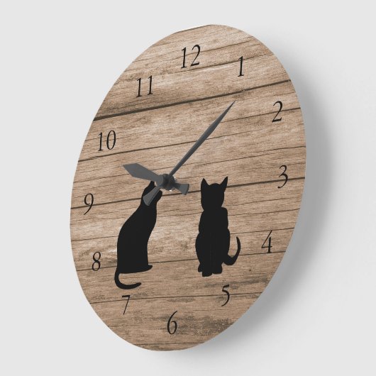 Modern cat silhouettes on rustic dark wood grote klok (Hoek)