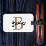 Modern Elegant Monogram Naam Zwart Goud Script Bagagelabel<br><div class="desc">De Modern Elegant Monogram Name Black Gold Script-Muismat is een stijlvolle en functionele toevoeging aan elke bureauopstelling. Het beschikt over een strakke zwarte achtergrond met een elegant gouden script ontwerp, dat kan worden gepersonaliseerd met een monogram en naam. Deze muismat biedt niet alleen een glad oppervlak voor uw muis, maar...</div>