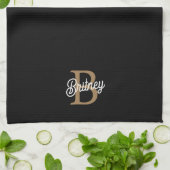 Modern Elegant Monogram Naam Zwart Goud Script Theedoek (Gevouwen)