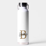 Modern Elegant Monogram Naam Zwart Goud Script Waterfles<br><div class="desc">De Modern Elegant Monogram Name Black Gold Script Water Bottle heeft een chique zwart ontwerp aangevuld met luxe gouden script. Personalisatie met een monogram en naam voegt een uniek tintje toe, waardoor het zowel stijlvol als functioneel is. Gemaakt van hoogwaardige materialen, houdt het dranken op de gewenste temperatuur terwijl het...</div>