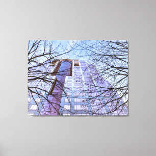 Modern gebouw met kale bomen canvas afdruk