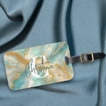 Modern Glam Luxe Aquamarijn Marmeren Gouden Glitte Bagagelabel<br><div class="desc">Dit aanpasbare bagagelabel combineert functionaliteit naadloos met elegantie. Het ontwerp heeft een betoverend aquamarijn marmeren patroon, dat de serene diepten van oceaanwater oproept. De wervelende aderen en ingewikkelde patronen creëer een gevoel van beweging en diepte. Verstrengeld met het marmer, glinsterende gouden glitteraderen en delicate wervelingen voegen een vleugje weelde toe....</div>