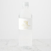 Modern Gold White Script Monogram Weddenschap Waterfles Etiket (Voorkant)