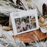 Modern kerstscript, geschikt voor vijf foto's feestdagen kaart<br><div class="desc">Dit moderne kerstscript met vijf foto's gevouwen vakantiekaart is perfect voor uw minimalistische shabby chic boho zwarte en witte feestdag. De minimale witte handgeschreven kalligrafie is delicaat en robuust, terwijl het klasje en elegant blijft. Het ontwerp weerspiegelt een eenvoudige, volledig witte winterdag en roept herinneringen op aan een meer simplistisch...</div>