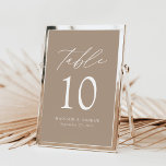 Modern legant taupe Weddenschappen Table Number<br><div class="desc">Trendy, minimalistische trouwlijstaantalkaarten met witte moderne letters met "Lijst" in modern kalligrafiekmanuscript. Het ontwerp is voorzien van een aantrekkelijke achtergrond of een kleur van uw keuze. Het ontwerp herhaalt zich op de rug. Om tot de kaarten van de taupetlijst opdracht te geven: voeg jouw naam, trouwdatum, en lijstaantal toe. Voeg...</div>