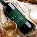 Modern Merry and Bright Green Holiday Wijn Etiket<br><div class="desc">Modern Christmas wine label featuring "Merry and Bright" in white lettering and green background with subtle white dots. Personalize the green holiday wine label with your custom greeting and family name in white lettering.</div>