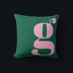 Modern Monogram Initial Letter Preppy Pink Green Kussen<br><div class="desc">This preppy monogram pillow features an oversized lowercase initial in pink against a deep green background. The bold, modern letterform adds personality and charm to teen rooms, dorms, and cozy spaces. Its clean, stylish look makes it easy to mix with colorful decor or classic prep accents. A fun, expressive design...</div>