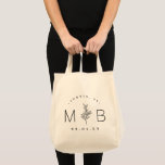 Modern Rustic Floral Stem Wedding Monogram Tote Bag<br><div class="desc">Aangepaste gedrukte canvas tassen maken een leuk en functioneel huwelijk in het voordeel van je gasten! Pas de sjabloon aan met de bruid- en bruidenamen of monogram-initialen. Voeg uw trouwdatum, de plaats, de staat of de plaatsnaam of een andere douanetekst toe. Dit moderne rustige logo-achtige ontwerp heeft een eenvoudige bloem...</div>