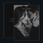 Modern Script Black Editorial Photo Save the Date<br><div class="desc">Your quiet luxury wedding deserves standout stationery. This black-and-white save-the-date skips the traditional look and puts your favorite engagement photo front and center. Why use a small picture? This full-bleed layout stretches your image to the very edges of the card. We placed an elegant, whimsical script right over the top...</div>