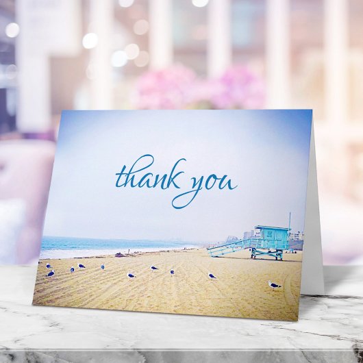 modern script op het strand van Californië Bedankkaart