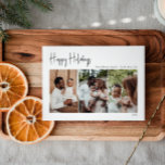 Modern script Prettige feestdagen drie-foto's Feestdagenkaart<br><div class="desc">Dit moderne manuscript prettige feestdagen drie-foto vakantiekaart is perfect voor uw minimalistische shabby chic boho zwarte en witte vakantiegroet. De minimale witte handgeschreven kalligrafie is delicaat en robuust, terwijl het klasje en elegant blijft. Het ontwerp weerspiegelt een eenvoudige, volledig witte winterdag en roept herinneringen op aan een meer simplistisch leven....</div>