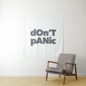 Modern, simple, bold cool graphic of Don't Panic Wandkleed (In situ)