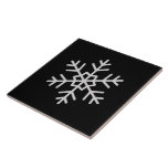 Modern Snowflake Accent Solid Black Tile Art Tegeltje<br><div class="desc">A sleek and stylish ceramic tile featuring a modern snowflake accent on a deep black background. Perfect for home décor,  holiday displays,  or custom art projects,  this tile brings a touch of winter elegance to any space. Durable,  glossy,  and versatile for creative uses.</div>