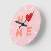 Modern thuishart op roze ronde klok (Hoek)