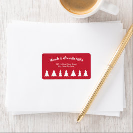 Modern wit script met kerstbomen op rood etiket