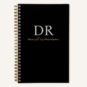 Modern zwart en goud Initiaal Script Monogram Notitieboek (Voorkant)