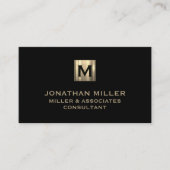 Modern zwart goudmonogram visitekaartje (Voorkant)