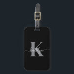 Modern zwart grijs script monogram bagagelabel<br><div class="desc">Dit eenvoudige, elegante zwarte bagagelabel met uw voornaam in een trendy schrift lettertype in het wit getypt over uw eerste initiaal in een modern petten lettertype in grijs aan de ene kant en een slide in kaart voor jouw naam, adres en telefoonnummer aan de andere kant zou er geweldig uitzien...</div>