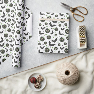 Moderne 3-ogige pompoen en vleermuizen Halloween Cadeaupapier