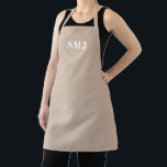 Moderne aangepaste monogram initialen beige-tan-wi schort<br><div class="desc">Modern custom monogram initialen beige geelbruin wit Schort. witte letters,  lichtroze achtergrond. u kunt uw bandkleur kiezen. geweldig cadeau voor mama,  vrienden en jezelf! Modern,  minimalistisch,  eenvoudig,  stijlvol design. Zeer geschikt voor koks,  koks,  aardewerk,  keramiek,  ambachten,  werk,  keuken,  bakken,  bbq,  grill,  en ook bedrijven en winkels,  enz</div>
