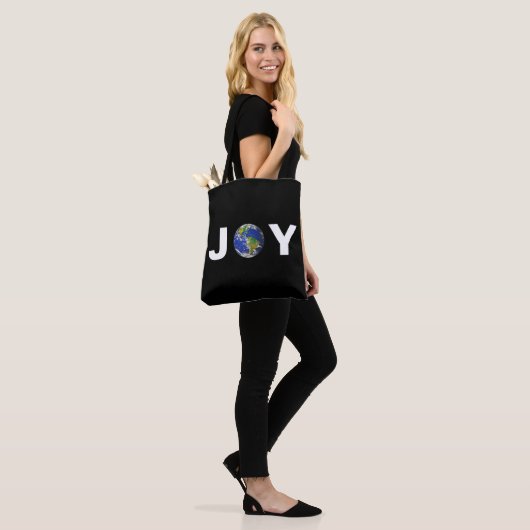 Moderne aardevreugde op zwart tote bag (Op model)
