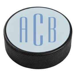 Moderne blauwe drielettermonogram hockey puck