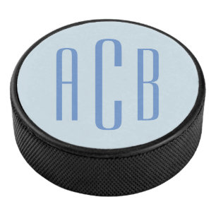 Moderne blauwe drielettermonogram hockey puck