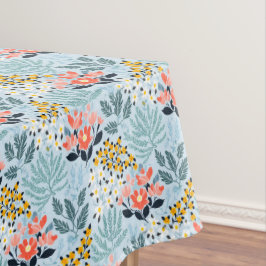 Moderne bloemen op blauw tafelkleed