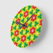 Moderne bloemen op groene en rode geometrische blo ronde klok (Hoek)